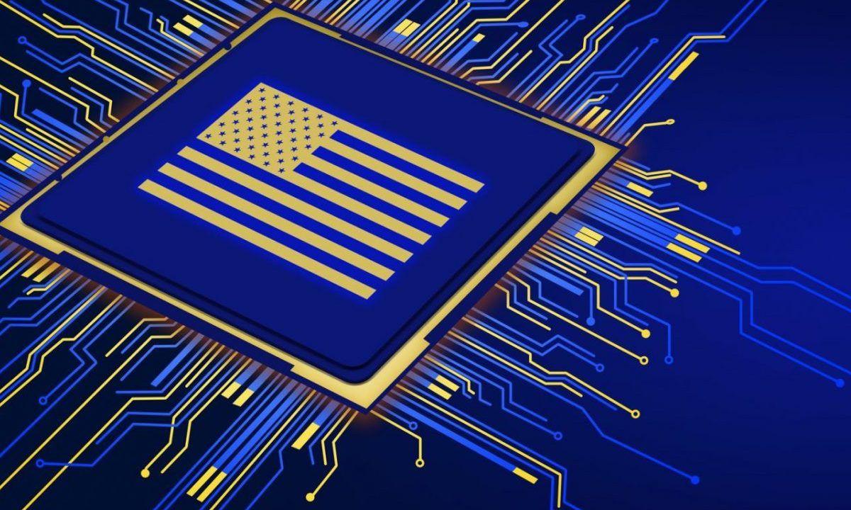 Une puce électronique aux couleurs du drapeau américain sur un circuit imprimé bleu